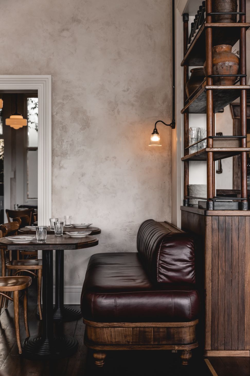 A leather booth in the corner of the dining room